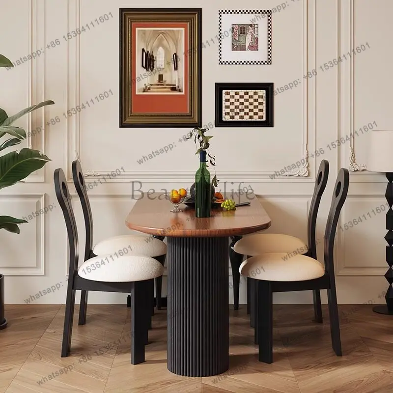 French retro solid wood dining table and chairs household small apartment semi-circular light luxury simple dining table
French retro solid wood dining table and chairs household small apartment semi-circular light luxury simple dining table