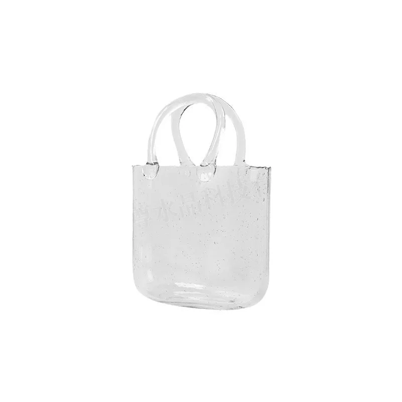 Fish tank handbag, glass vase, high-value guest restaurant vase flower arrangement, advanced hydroponic decoration ornament
Fish tank handbag, glass vase, high-value guest restaurant vase flower arrangement, advanced hydroponic decoration ornament