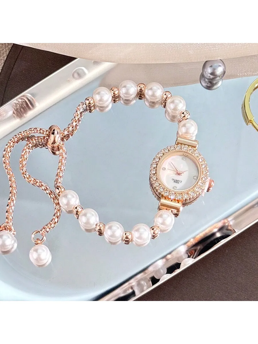 Womens Rose Gold Tone Pearl Bead Quartz Watch With Crystal Encrusted Case And Mother Of Pearl Dial
Womens Rose Gold Tone Pearl Bead Quartz Watch With Crystal Encrusted Case And Mother Of Pearl Dial