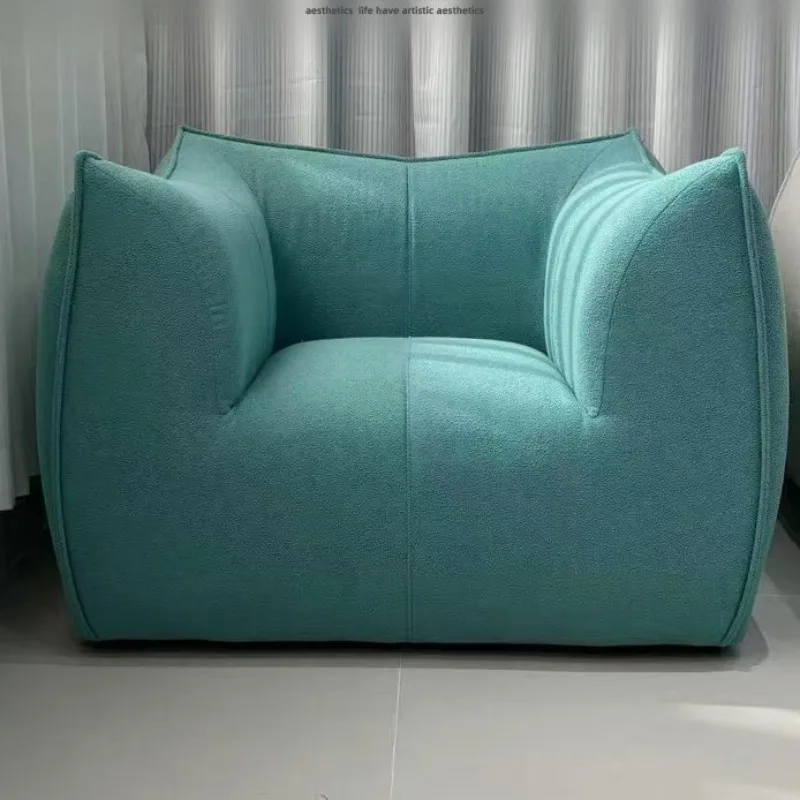 Single sofa designer casual modern simple fabric lazy sofa
Single sofa designer casual modern simple fabric lazy sofa