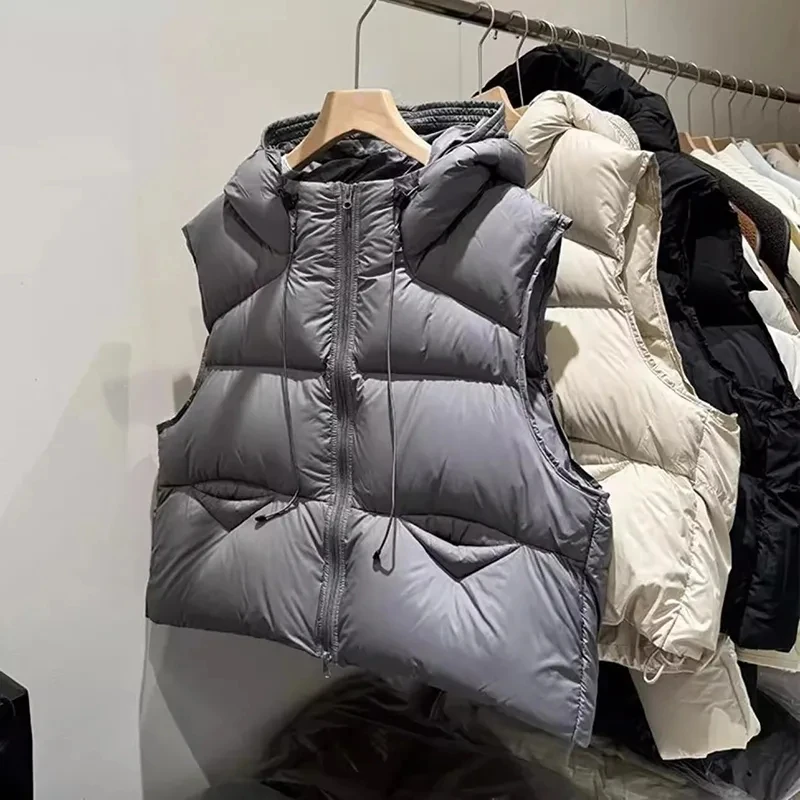 Fashion Temperament Down Cotton Vest Jacket 2026 Autumn Winter New Hooded Loose Short Style Puff Waistcoat Women's Casual Top
Fashion Temperament Down Cotton Vest Jacket 2026 Autumn Winter New Hooded Loose Short Style Puff Waistcoat Women's Casual Top