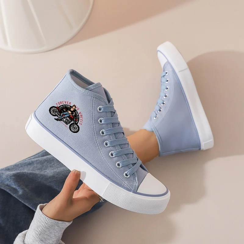 Women's Light Blue High-Top Canvas Sneakers: Platform Sole & Cartoon Motorcycle Print. Lace-Up for Daily Casual Wear.
Women's Light Blue High-Top Canvas Sneakers: Platform Sole & Cartoon Motorcycle Print. Lace-Up for Daily Casual Wear.
