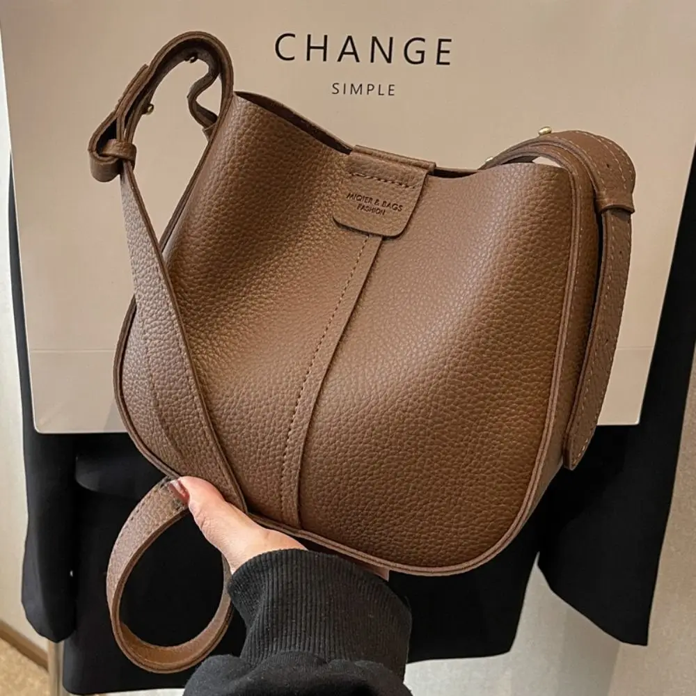 Korean Style Lichee Pattern Crossbody Bag with Inner Pouch Solid Color PU Bucket Bag Large Capacity Casual Shoulder Bag
Korean Style Lichee Pattern Crossbody Bag with Inner Pouch Solid Color PU Bucket Bag Large Capacity Casual Shoulder Bag