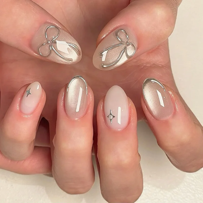 24Pcs Cat's Eye Design Fake Nail with Pearl Short Round Head Press on False Nails Silver French Bow Pattern Full Cover Nail Tips
24Pcs Cat's Eye Design Fake Nail with Pearl Short Round Head Press on False Nails Silver French Bow Pattern Full Cover Nail Tips