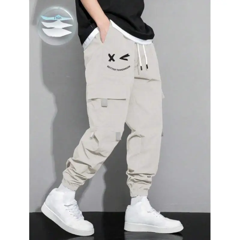 Свободные мужские спортивные брюки с завязками на талии, чехол на голову, молния, буквенный узор, винтажный Sle Ciwalk, длина девять очков
Свободные мужские спортивные брюки с завязками на талии, чехол на голову, молния, буквенный узор, винтажный Sle Ciwalk, длина девять очков