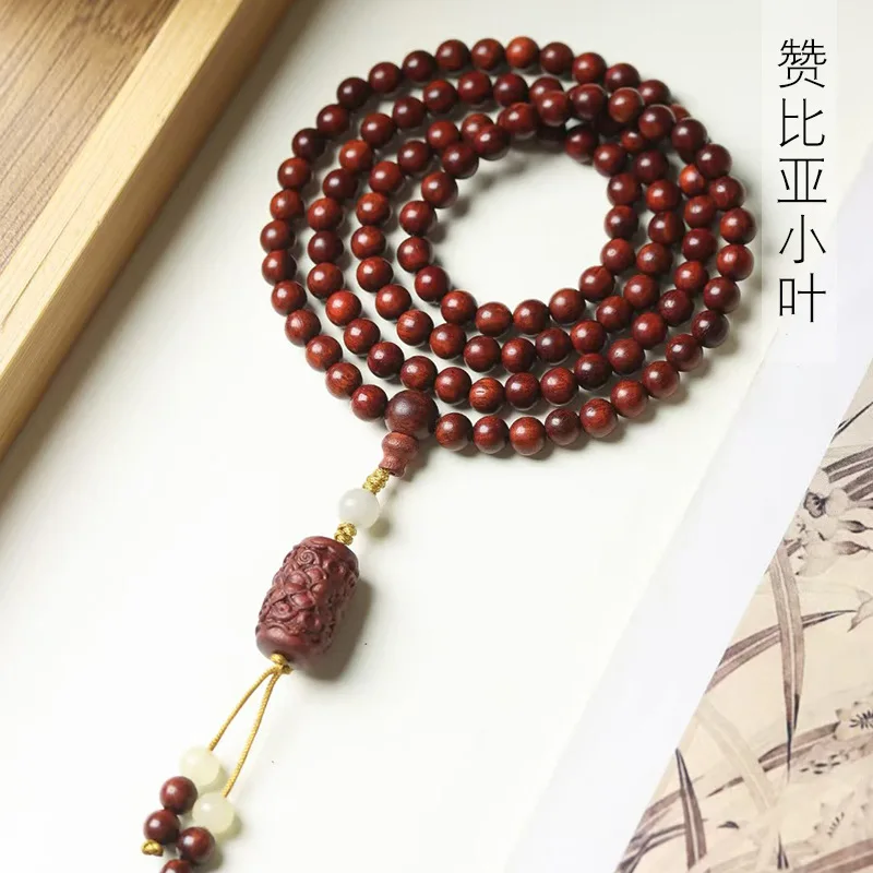 Zambia small-leaf rosewood DIY lotus-style bracelet, 0.6*108 beads, unisex prayer beads
Zambia small-leaf rosewood DIY lotus-style bracelet, 0.6*108 beads, unisex prayer beads