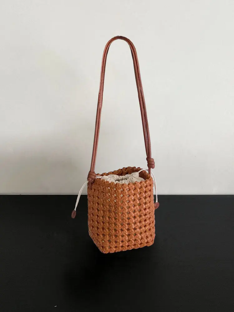 Hollow-knit bucket bag for women, small stylish versatile handbag with top handle, shoulder strap and crossbody option
Hollow-knit bucket bag for women, small stylish versatile handbag with top handle, shoulder strap and crossbody option