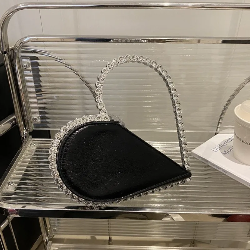 Rhinestone dinner large capacity messenger bag love shape handbag wrist bags metal handle women's handbag
Rhinestone dinner large capacity messenger bag love shape handbag wrist bags metal handle women's handbag