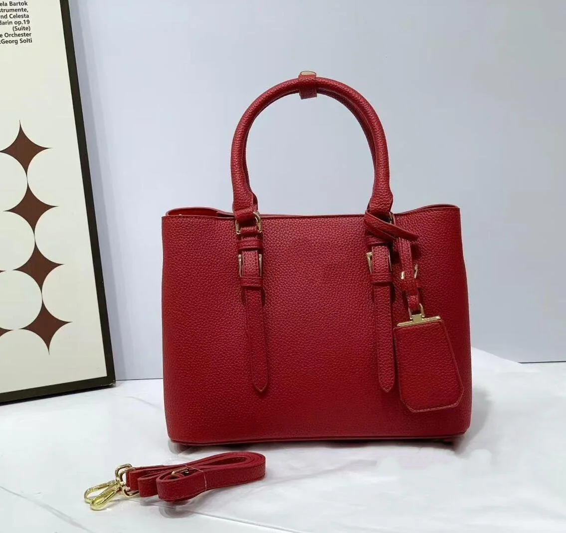 Minimalist Black Grained Leather Tote, Detachable Shoulder Strap, Red Interior, Multi-Use Handbag for Work, Travel & Everyday Outings gab pradaeS
Minimalist Black Grained Leather Tote, Detachable Shoulder Strap, Red Interior, Multi-Use Handbag for Work, Travel & Everyday Outings gab pradaeS