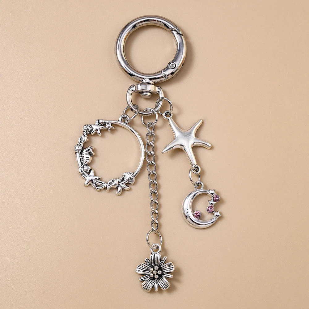 Cute Metal Flower Key Chain Star Moon Key Ring for Women Girls Handbag Pendants DIY Handmade Jewelry Accessories
Cute Metal Flower Key Chain Star Moon Key Ring for Women Girls Handbag Pendants DIY Handmade Jewelry Accessories
