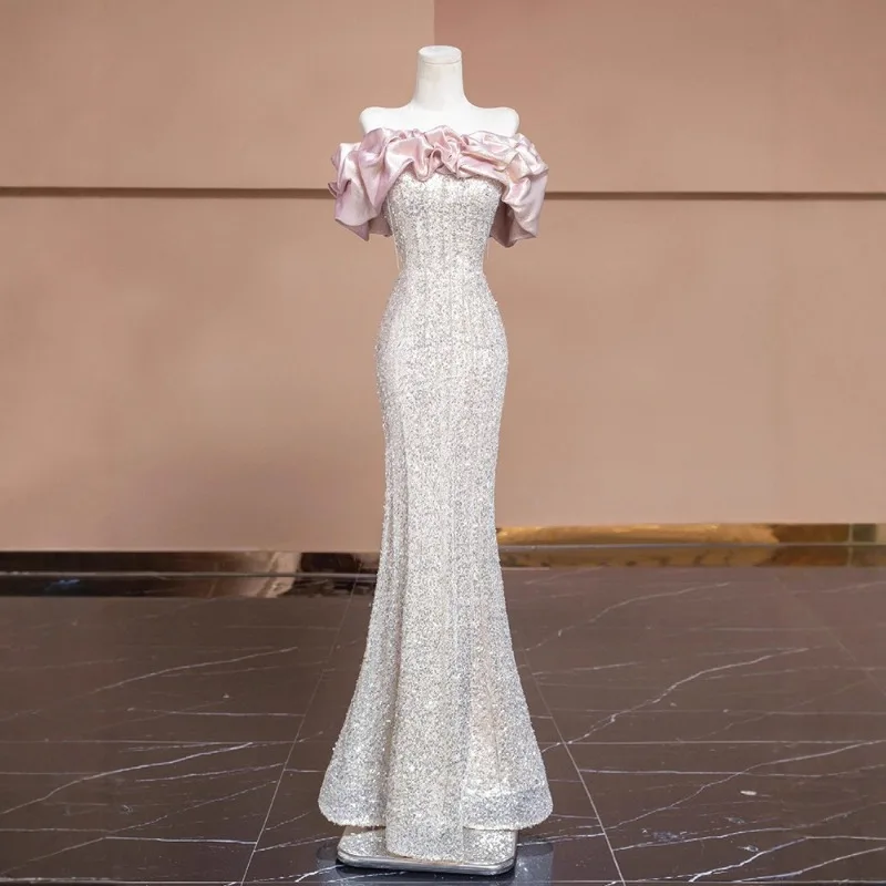 2026 Summer New Women's One Shoulder Banquet Evening Dress Fashionable Slimming and Tailored Glittered Back Long Fishtail Dress
2026 Summer New Women's One Shoulder Banquet Evening Dress Fashionable Slimming and Tailored Glittered Back Long Fishtail Dress