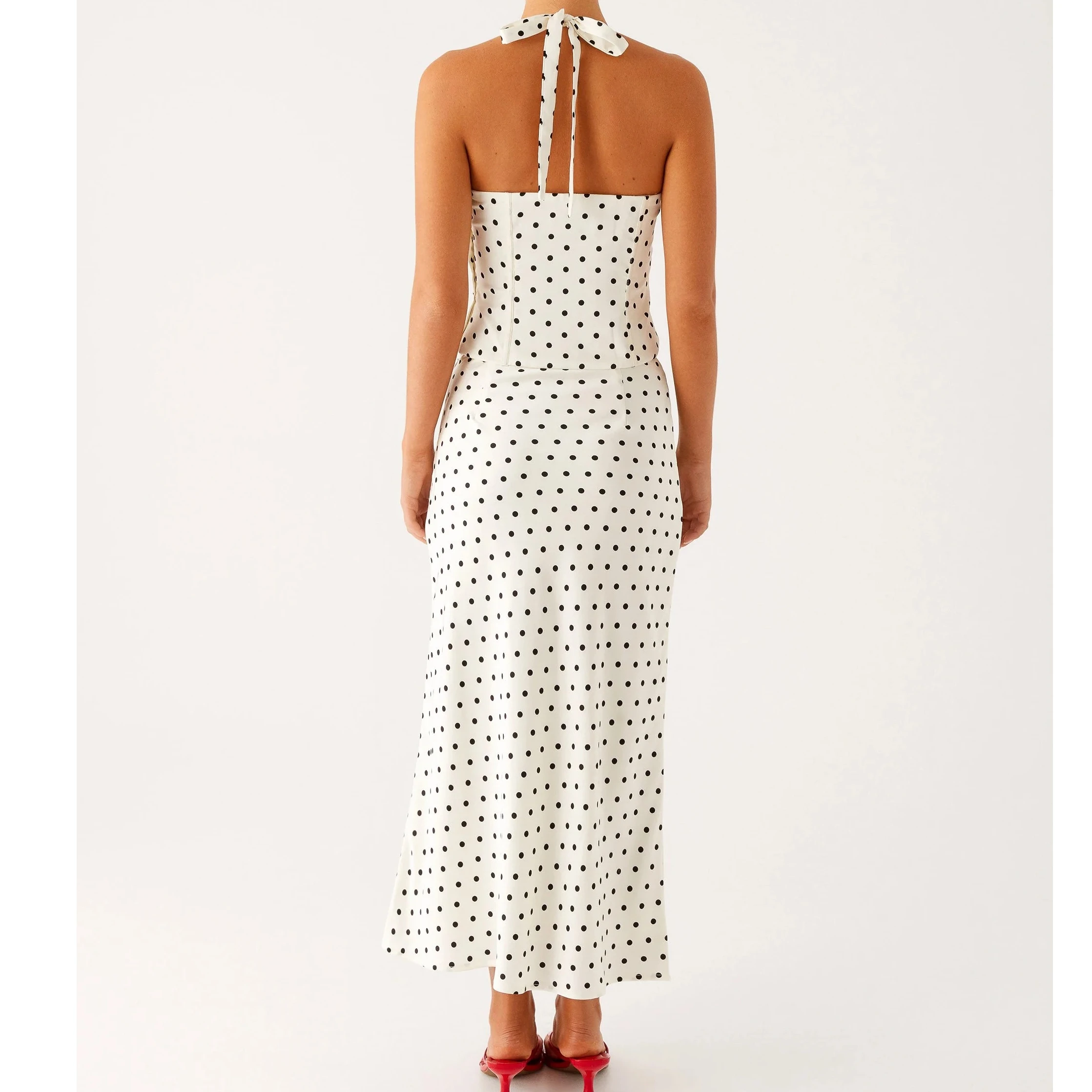 Женский комплект из двух предметов с юбкой, черный комплект в горошек без рукавов с лямкой на шее, укороченный топ на бретельках и макси-юбка, элегантные комплекты платьев 
Женский комплект из двух предметов с юбкой, черный комплект в горошек без рукавов с лямкой на шее, укороченный топ на бретельках и макси-юбка, элегантные комплекты платьев