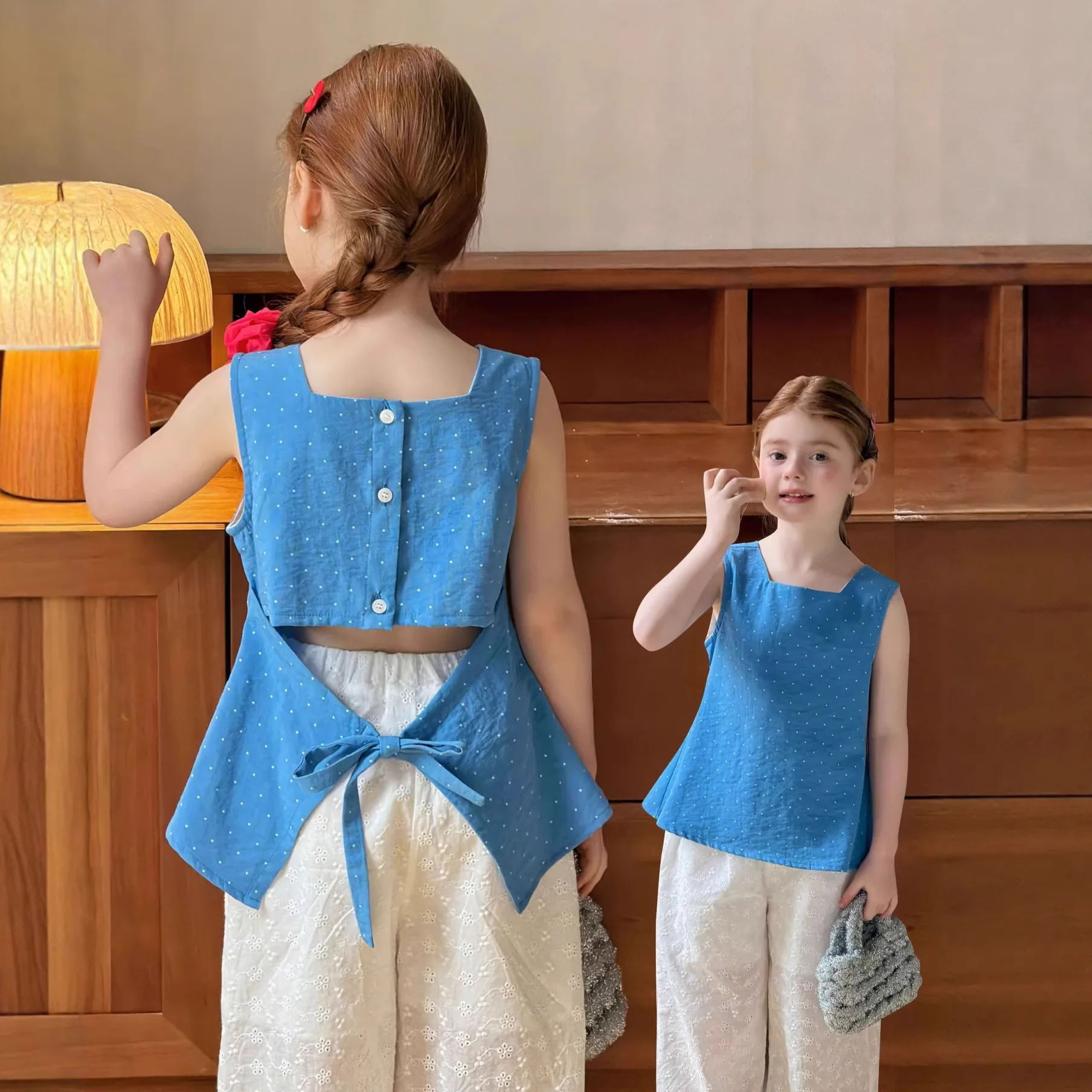 Girls Vest Doll Shirt 2026 Summer New Korean Retro Polka Dot Cotton and Linen Sleeveless Top Versatile
Girls Vest Doll Shirt 2026 Summer New Korean Retro Polka Dot Cotton and Linen Sleeveless Top Versatile