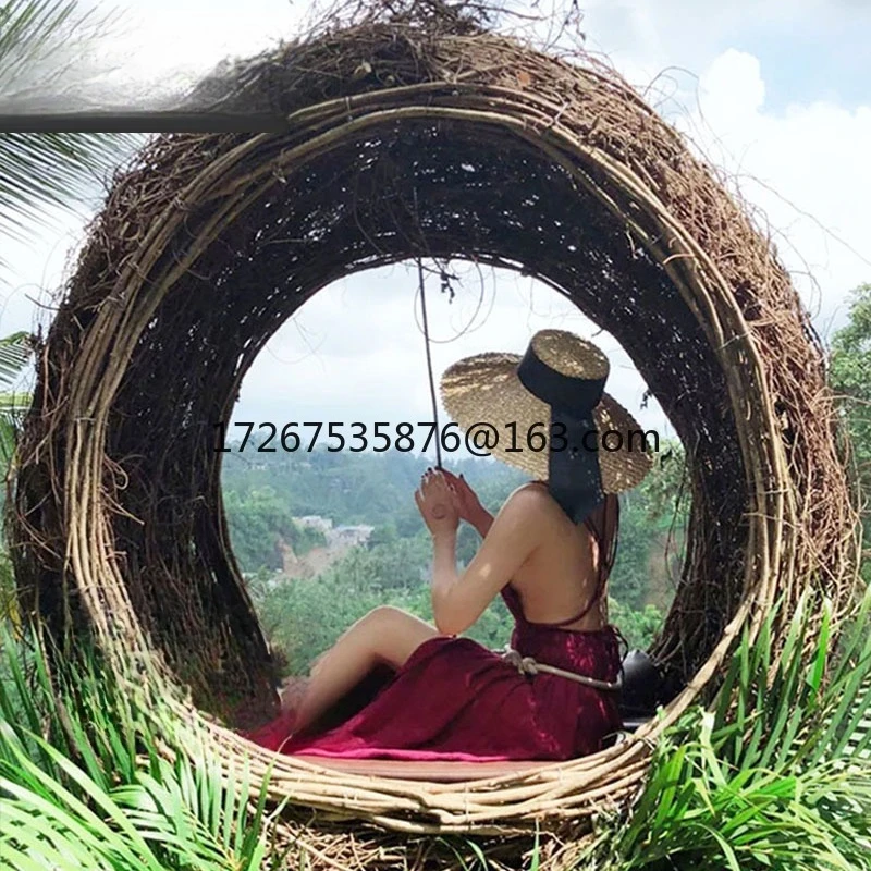 Bird's Nest rattan outdoor landscape props floor chair scenic spot with lamp bird's nest decoration
Bird's Nest rattan outdoor landscape props floor chair scenic spot with lamp bird's nest decoration