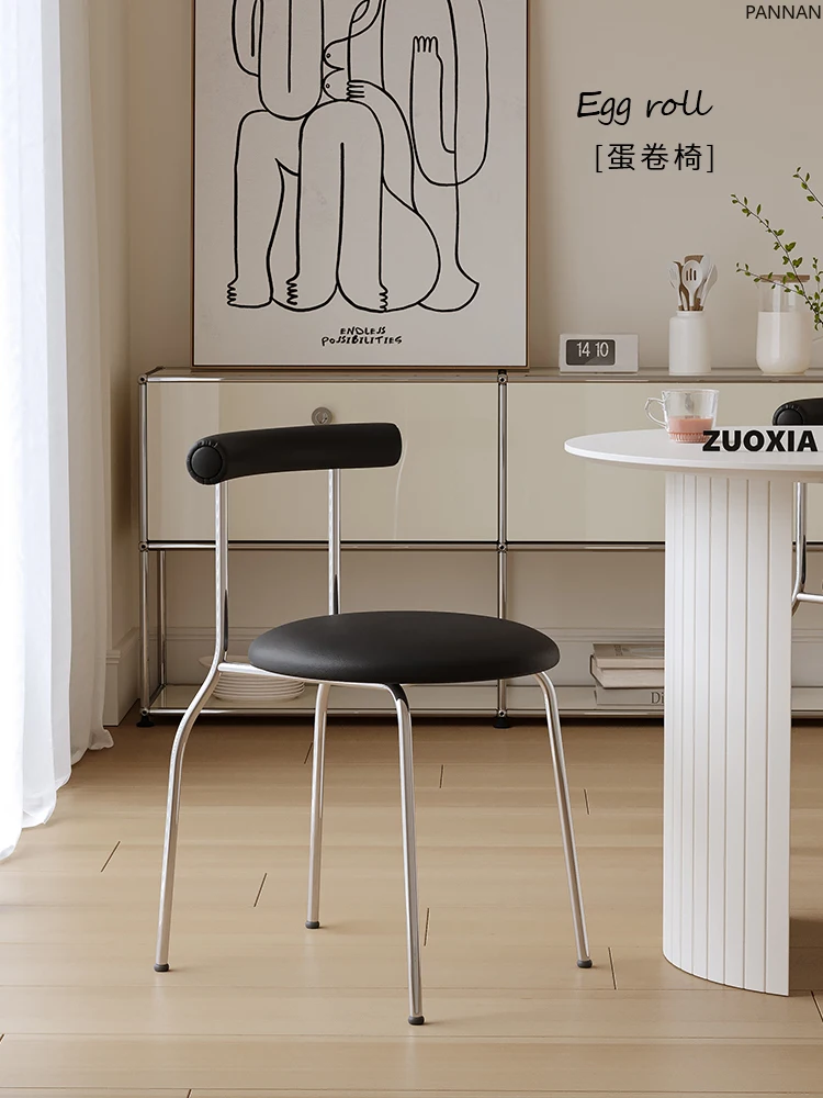 Italian casual dining chair modern simple light luxury black back chair soft bag leather chair
Italian casual dining chair modern simple light luxury black back chair soft bag leather chair