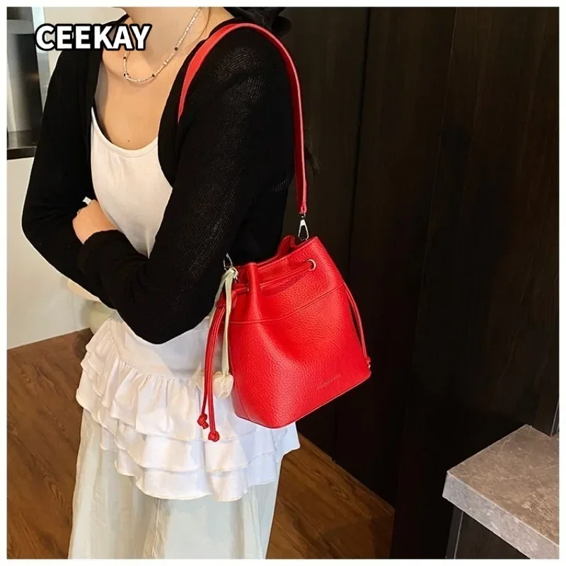 CEEKAY Women's Bucket Bag Red Textured PU Leather Drawstring Shoulder Handbag Tassel Detail Daily Casual Elegant Style
CEEKAY Women's Bucket Bag Red Textured PU Leather Drawstring Shoulder Handbag Tassel Detail Daily Casual Elegant Style