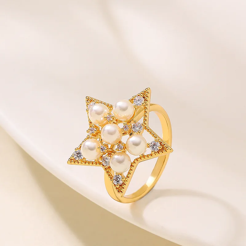 Fashionable, super fairy and sweet temperament, fairy style diamond-set pearl five-pointed star adjustable open ring bracelet
Fashionable, super fairy and sweet temperament, fairy style diamond-set pearl five-pointed star adjustable open ring bracelet