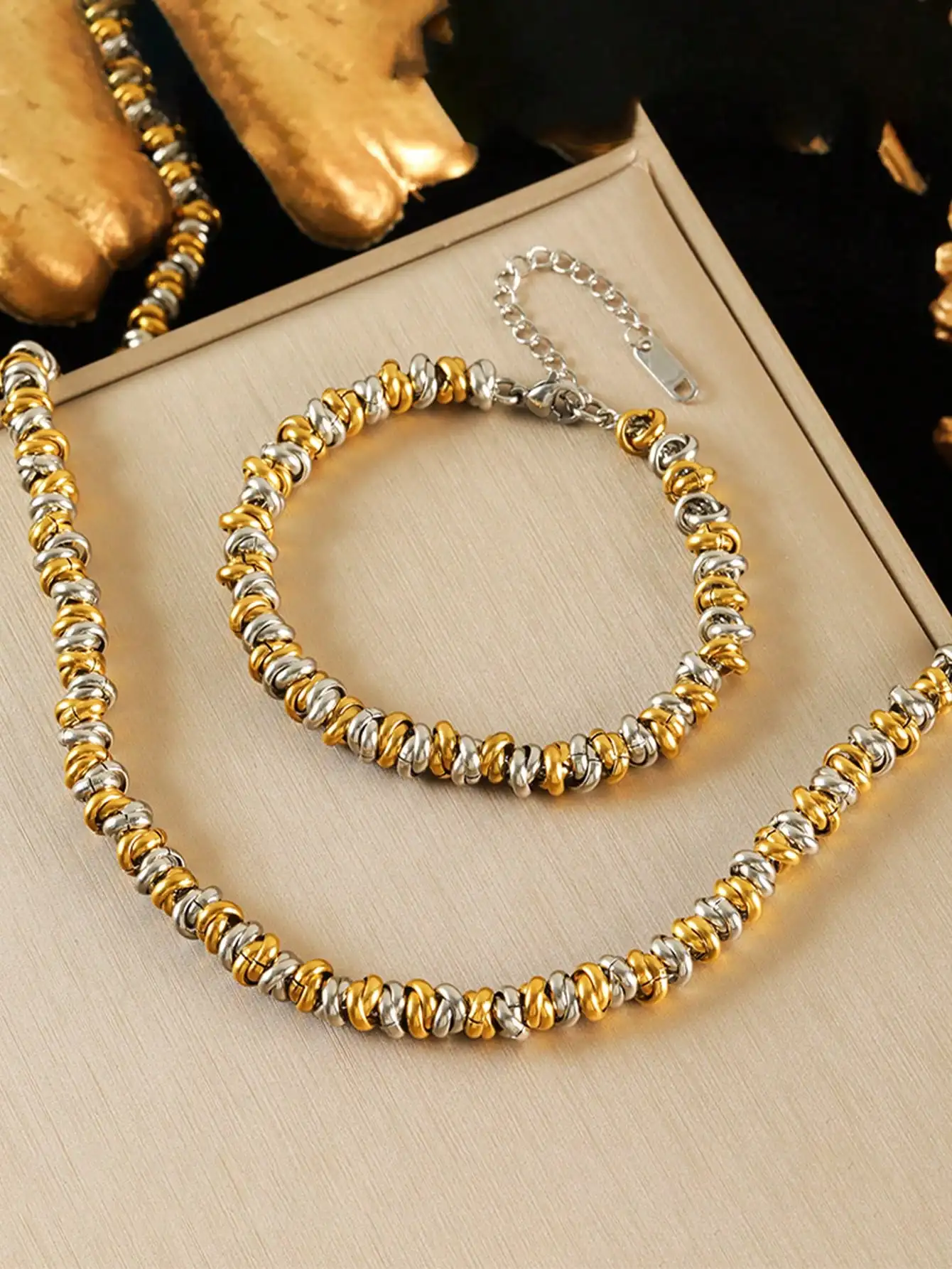 Stainless Steel Gold & Silver Twisted Bead Necklace and Bracelet Set
Stainless Steel Gold & Silver Twisted Bead Necklace and Bracelet Set