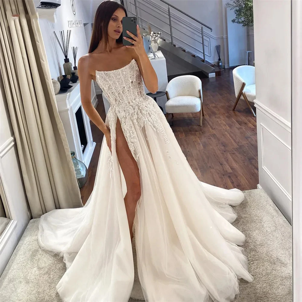 2023 Glitter Lace Wedding Dresses Shiny Off Shoulder A-Line Side Slit Appliques Bridal Gowns Backless Square Collar Vestidos De
2023 Glitter Lace Wedding Dresses Shiny Off Shoulder A-Line Side Slit Appliques Bridal Gowns Backless Square Collar Vestidos De