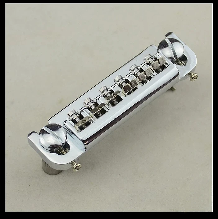 Korean-made Silver Guitar Peg String Holder Integrated Electric Guitar Fixed Bridge Tuning Peg
Korean-made Silver Guitar Peg String Holder Integrated Electric Guitar Fixed Bridge Tuning Peg