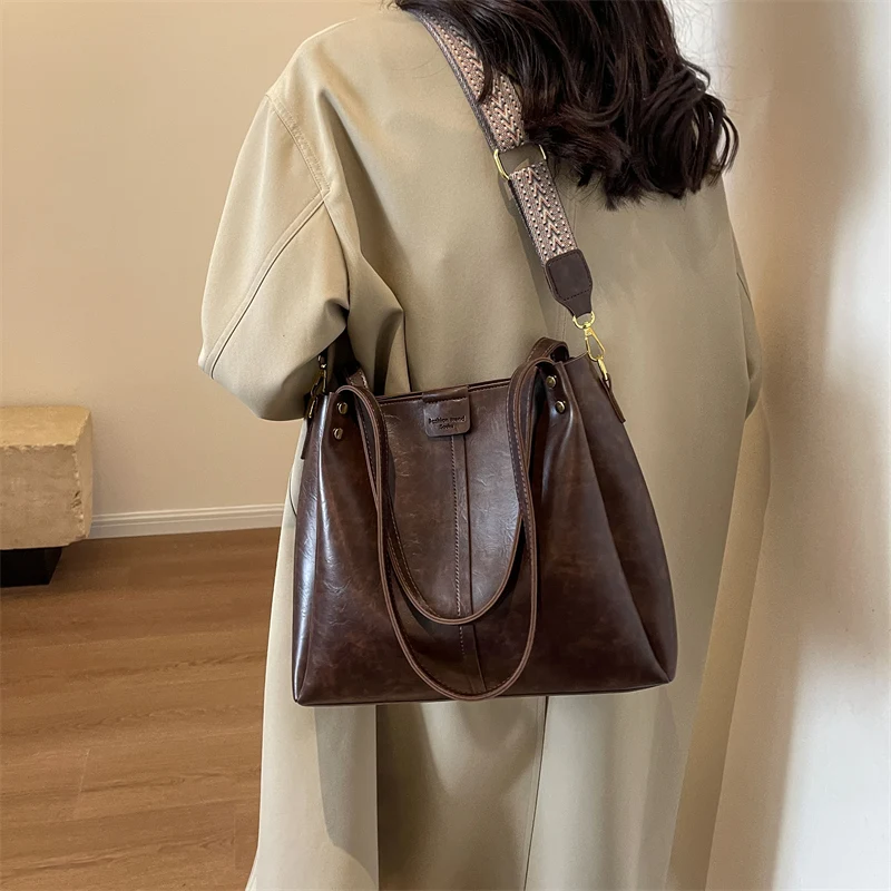 Chic Business Casual Crossbody Handbag With Elegant Paris Influence And Large Interior Perfect For Use As A Ladies Diaper Bag
Chic Business Casual Crossbody Handbag With Elegant Paris Influence And Large Interior Perfect For Use As A Ladies Diaper Bag