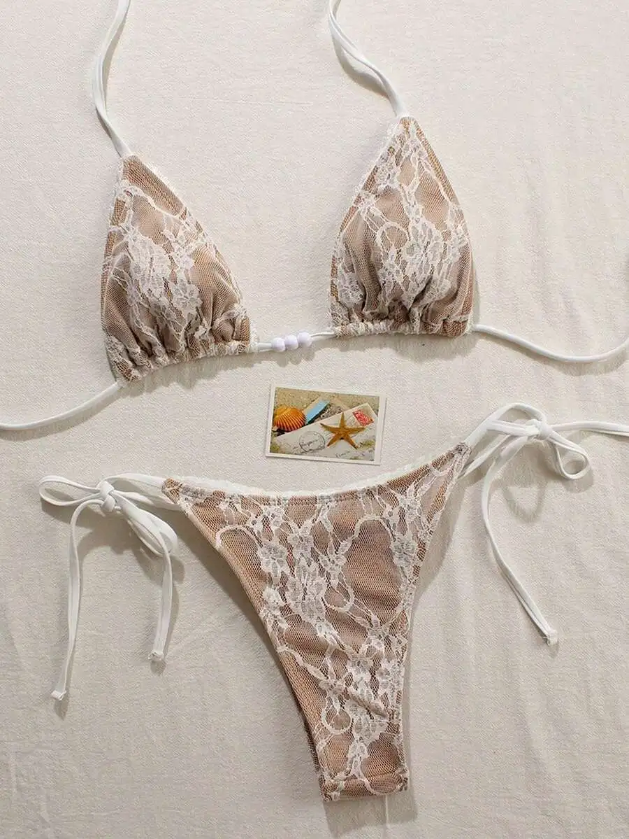 Beige Lace Triangle Bikini Set With White Strings And Bead Detail For Summer Beach Wear
Beige Lace Triangle Bikini Set With White Strings And Bead Detail For Summer Beach Wear