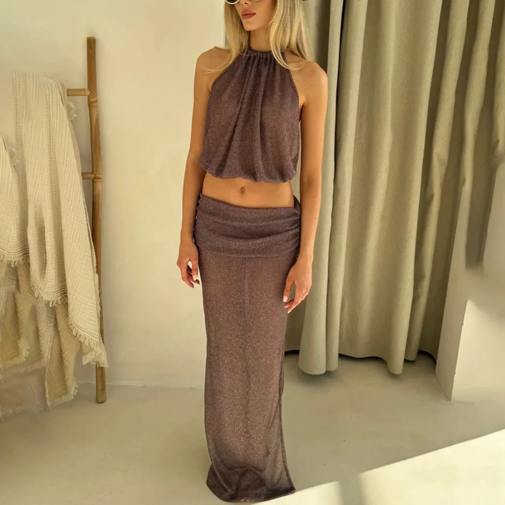 Sexy Backless Sun Skirt Suit Spring and Summer Women Casual Exposed Navel Shiny Silk Micro Perspective Knitted Top Skirt 2pcs
Sexy Backless Sun Skirt Suit Spring and Summer Women Casual Exposed Navel Shiny Silk Micro Perspective Knitted Top Skirt 2pcs