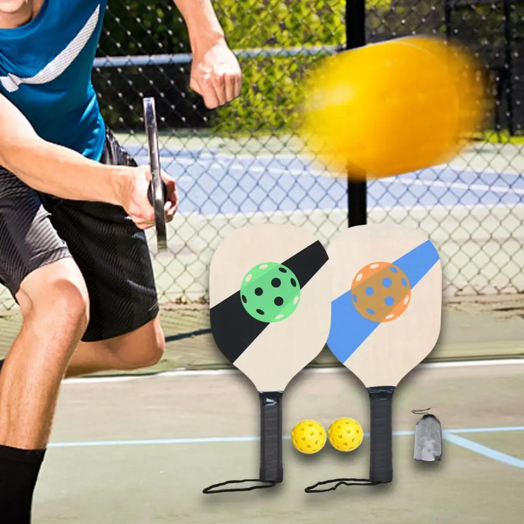 Wooden Set 2 Paddles 2 Pickle Balls Beginner Racket for Child, Teens and Adults Comfortable Grip
Wooden Set 2 Paddles 2 Pickle Balls Beginner Racket for Child, Teens and Adults Comfortable Grip