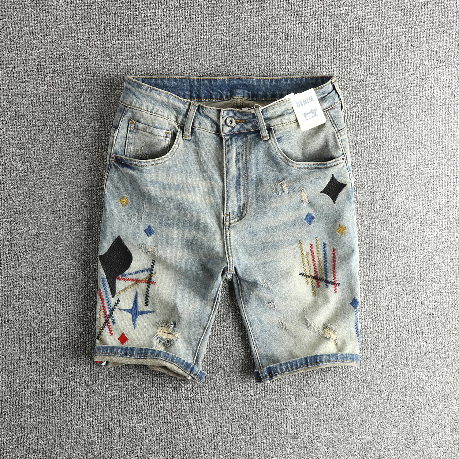 Heavy embroidery craft washing and old retro trendy denim shorts men's summer versatile youth ripped mid-trouser pants
Heavy embroidery craft washing and old retro trendy denim shorts men's summer versatile youth ripped mid-trouser pants
