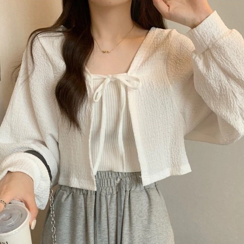 Thin Sunscreen Women Cardigan White Breathable Knitted Top Korean Version Strap Short Lantern Sleeve Outer Cropped Tops
Thin Sunscreen Women Cardigan White Breathable Knitted Top Korean Version Strap Short Lantern Sleeve Outer Cropped Tops