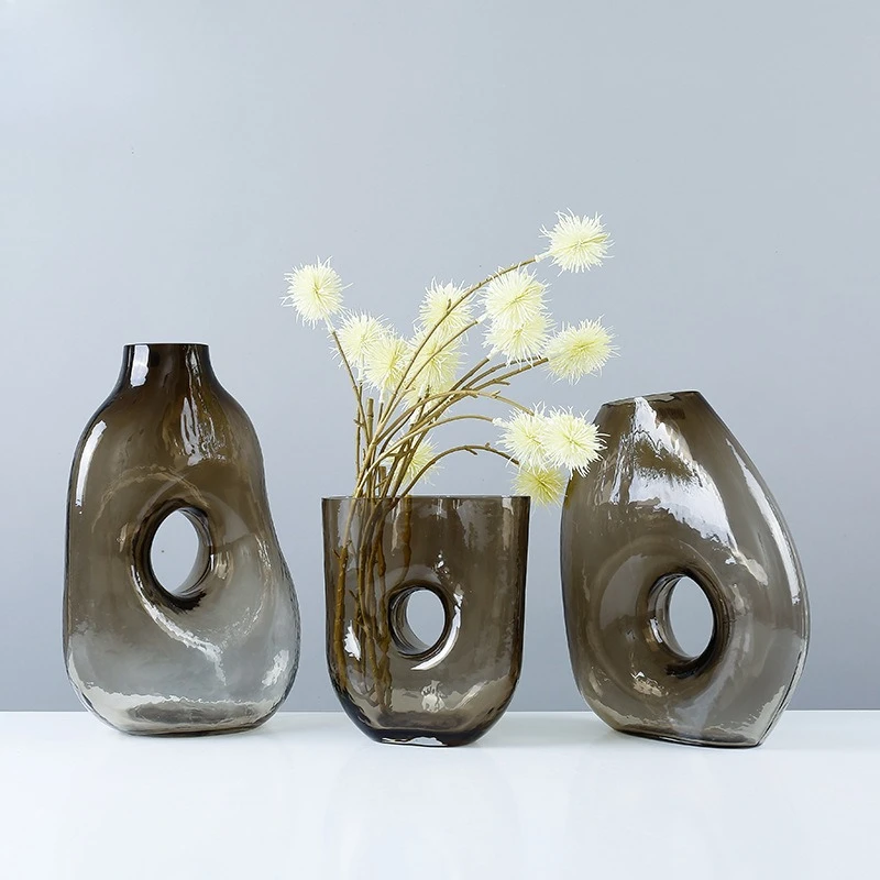 Creative glass vase art irregular shape empty high-end vase ornament
Creative glass vase art irregular shape empty high-end vase ornament