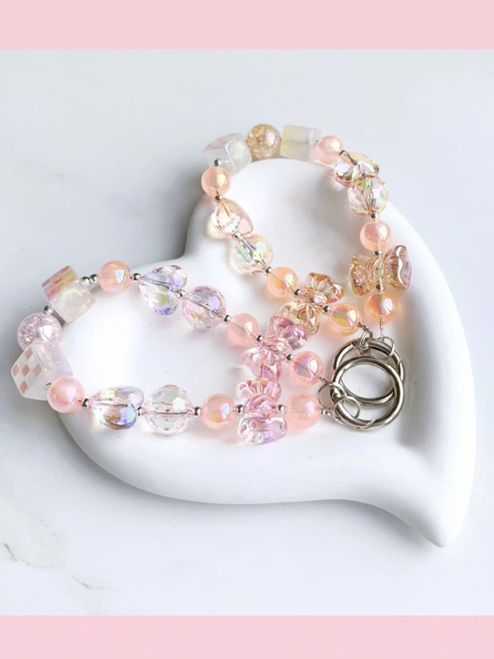 Heart-Shaped Crystal Beads Keychains Flower Balls Mobile Phone Pendants Bow Ties Beaded Digital Bags Universal Portable Lanyards
Heart-Shaped Crystal Beads Keychains Flower Balls Mobile Phone Pendants Bow Ties Beaded Digital Bags Universal Portable Lanyards