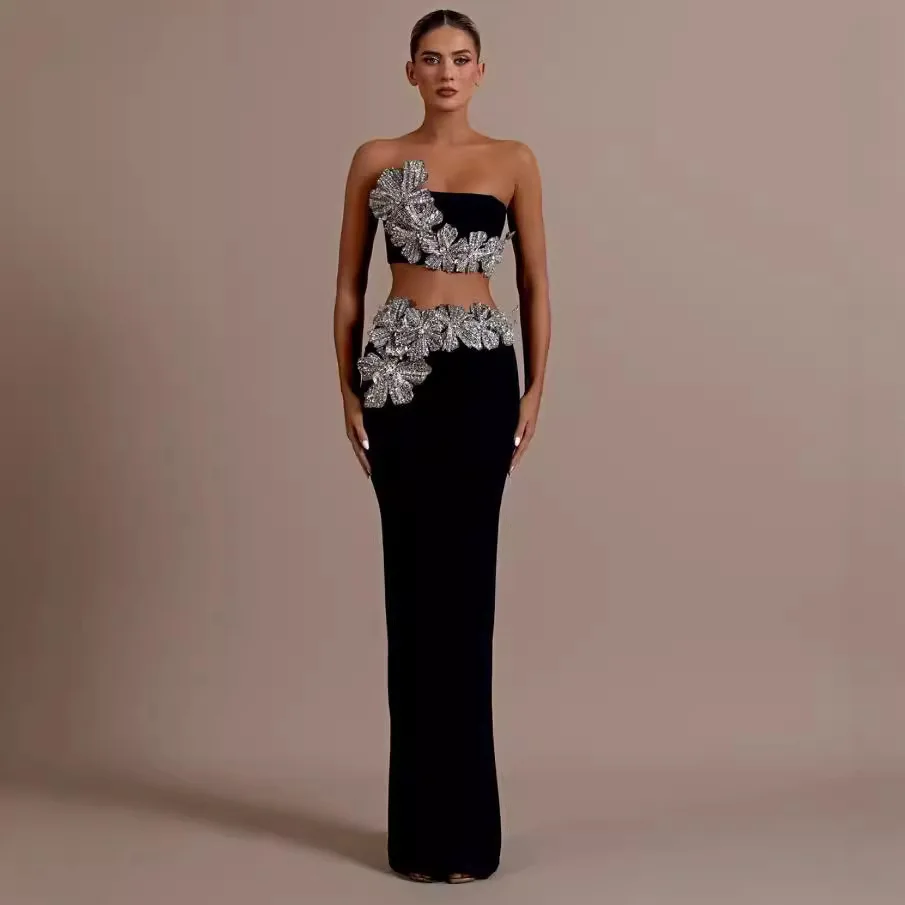 Black party bandage skirt set, rhinestone applique tube top, long skirt, two-piece set, new hot sale, high-end classic, sexy.
Black party bandage skirt set, rhinestone applique tube top, long skirt, two-piece set, new hot sale, high-end classic, sexy.