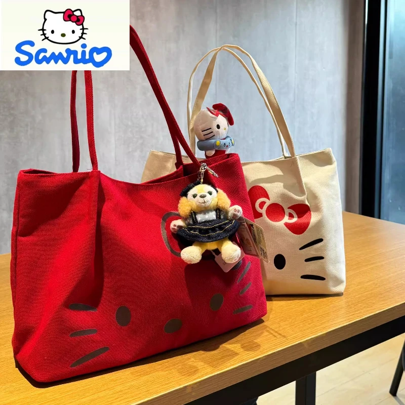 Sanrio Высококачественная холщовая сумка-тоут для женщин с рисунком Hello Kitty, большая вместительная повседневная универсальная сумка
Sanrio Высококачественная холщовая сумка-тоут для женщин с рисунком Hello Kitty, большая вместительная повседневная универсальная сумка