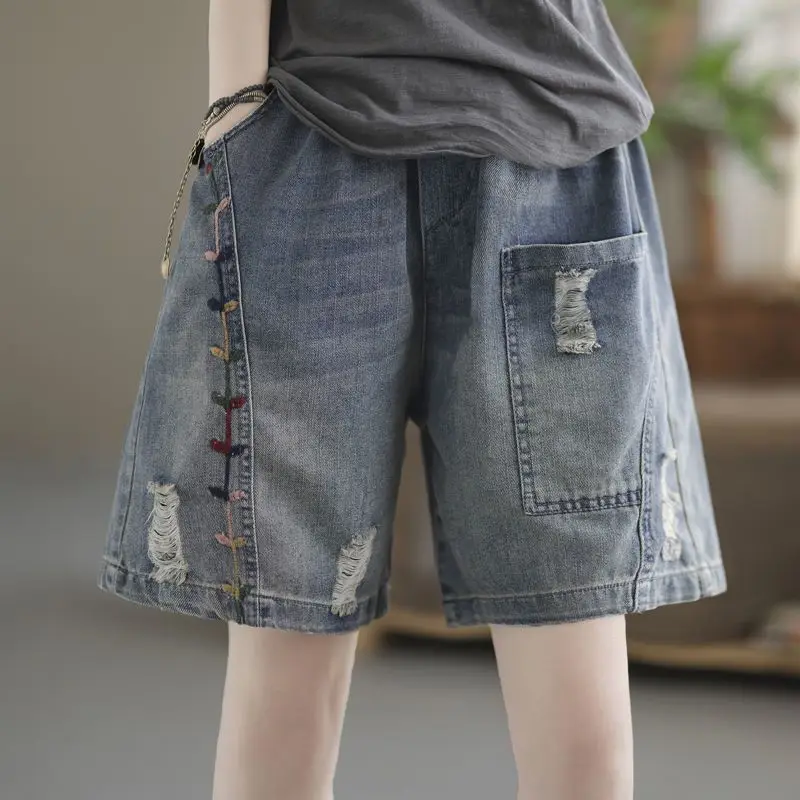 Embroidered Distressed Denim Shorts, High Waisted Loose-Fit Wide Leg Jean Shorts with Floral Embroidery and Ripped Details
Embroidered Distressed Denim Shorts, High Waisted Loose-Fit Wide Leg Jean Shorts with Floral Embroidery and Ripped Details