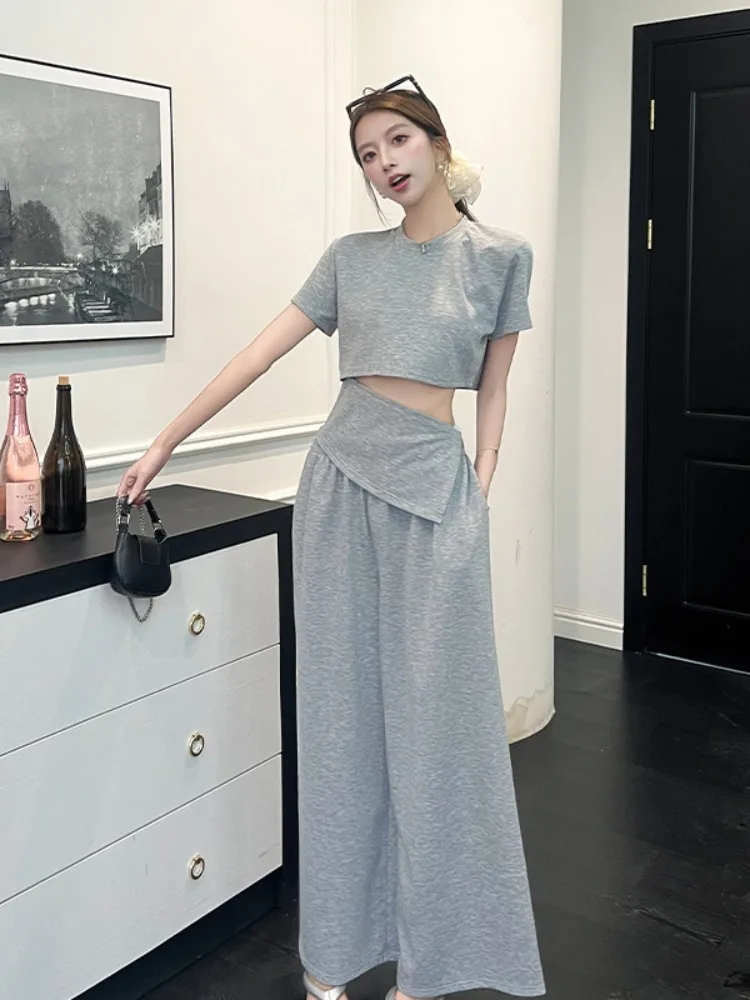Korean Style Anti-Aging Fashion Set Women Summer Simple Asymmetrical Short Sleeve Loose Casual Wide Leg Pants Two Piece Set
Korean Style Anti-Aging Fashion Set Women Summer Simple Asymmetrical Short Sleeve Loose Casual Wide Leg Pants Two Piece Set