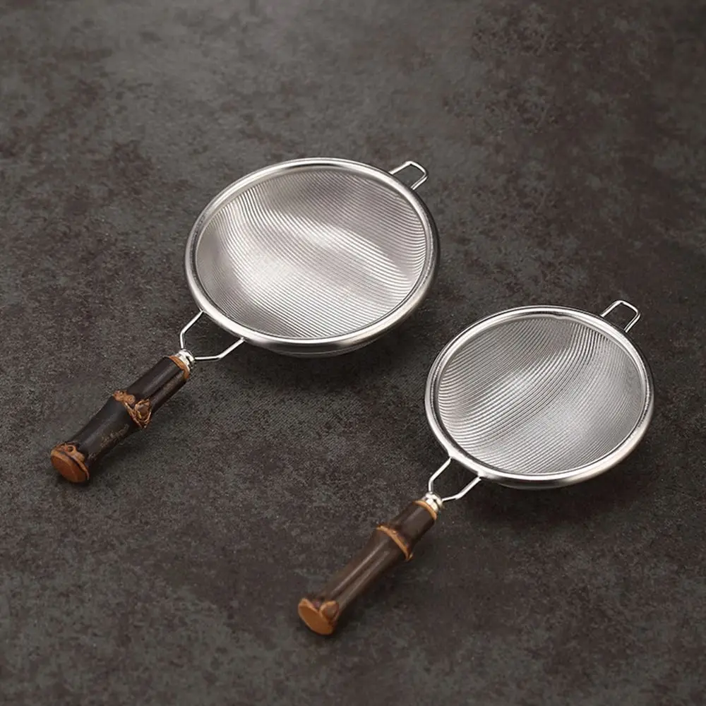 Stainless Steel Tea Strainer with Handle Bamboo Handle Reusable Metal Tea Infuser with Metal Holder Comfortable To Grip
Stainless Steel Tea Strainer with Handle Bamboo Handle Reusable Metal Tea Infuser with Metal Holder Comfortable To Grip