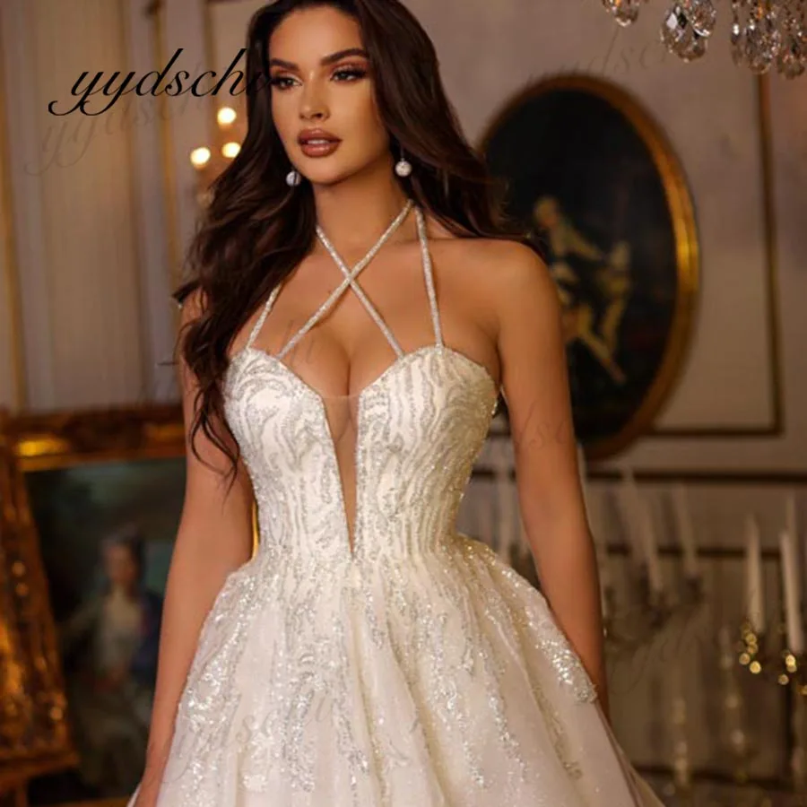 Shiny Exquisite V-Neck Ball Gown Halter Sleeveless Wedding Dress Lace Sparkly Tulle Appliques 2023 Sexy Bridal Dress For Women
Shiny Exquisite V-Neck Ball Gown Halter Sleeveless Wedding Dress Lace Sparkly Tulle Appliques 2023 Sexy Bridal Dress For Women