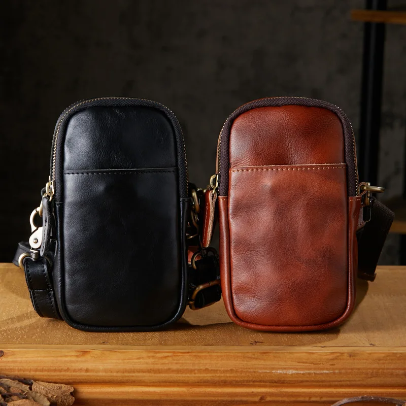 Handmade leather men's single shoulder crossbody vertical casual men's vegetable tanned cowhide mobile phone bag mini small fann
Handmade leather men's single shoulder crossbody vertical casual men's vegetable tanned cowhide mobile phone bag mini small fann