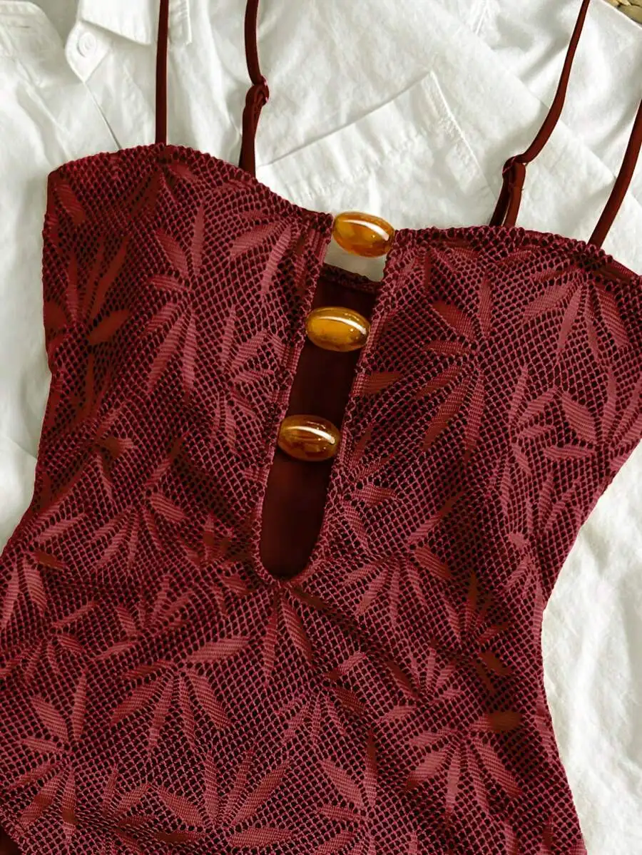 Womens Boho Halter One-Piece Swimsuit With Leaf Pattern And Button Detail
Womens Boho Halter One-Piece Swimsuit With Leaf Pattern And Button Detail