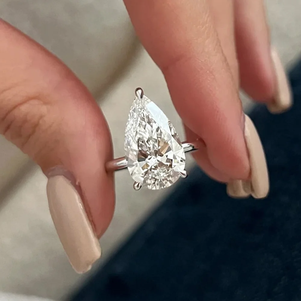 OEVAS 1-4ct D Color Water Drop Moissanite Rings For Women 925 Sterling Silver Sparkling Wedding Party Fine Jewelry Wholesale
OEVAS 1-4ct D Color Water Drop Moissanite Rings For Women 925 Sterling Silver Sparkling Wedding Party Fine Jewelry Wholesale