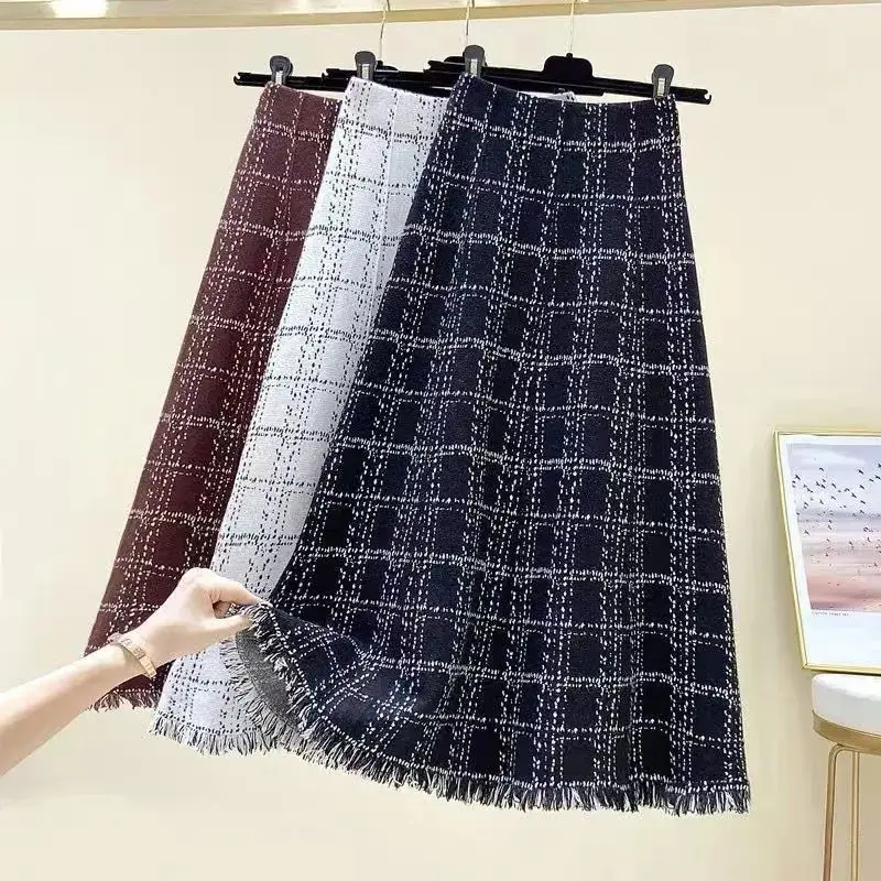 Винтажная вязаная юбка А-силуэта с клетчатым узором и бахромой, на резинке, с высокой талией, свободного кроя, длиной до середины икры, для женщин, модная одежда
Винтажная вязаная юбка А-силуэта с клетчатым узором и бахромой, на резинке, с высокой талией, свободного кроя, длиной до середины икры, для женщин, модная одежда