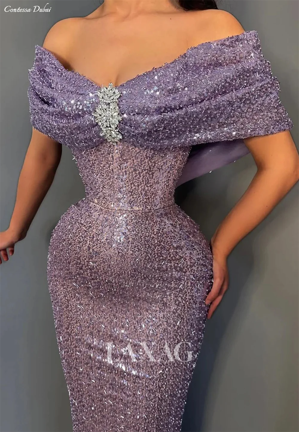Contessa Custom Lavender Shiny Sequin Off-Shoulder Gown with Crystal Detail & Fitted Bodycon Design Backless Prom Dress
Contessa Custom Lavender Shiny Sequin Off-Shoulder Gown with Crystal Detail & Fitted Bodycon Design Backless Prom Dress