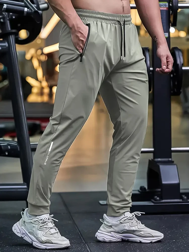 7XL Lightweight Sports Pants Man Loose Ice Silk Summer Gym Fitness Pants Elastic Waist Drawstring Plus Size casual Sweatpants
7XL Lightweight Sports Pants Man Loose Ice Silk Summer Gym Fitness Pants Elastic Waist Drawstring Plus Size casual Sweatpants