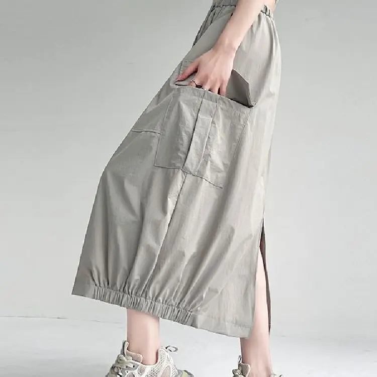 2025 summer new split drawstring pocket American elastic skirt bud tooling high waist long skirt
2025 summer new split drawstring pocket American elastic skirt bud tooling high waist long skirt