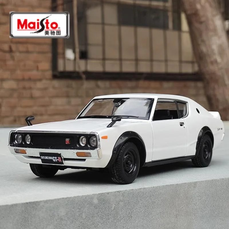 Maisto 1:24 Nissan Skyline 2000 GT-R 1973, модель спортивного автомобиля из сплава, литой под давлением металлический гоночный автомобиль, модель автомобиля, имитация детской игрушки в подарок
Maisto 1:24 Nissan Skyline 2000 GT-R 1973, модель спортивного автомобиля из сплава, литой под давлением металлический гоночный автомобиль, модель автомобиля, имитация детской игрушки в подарок