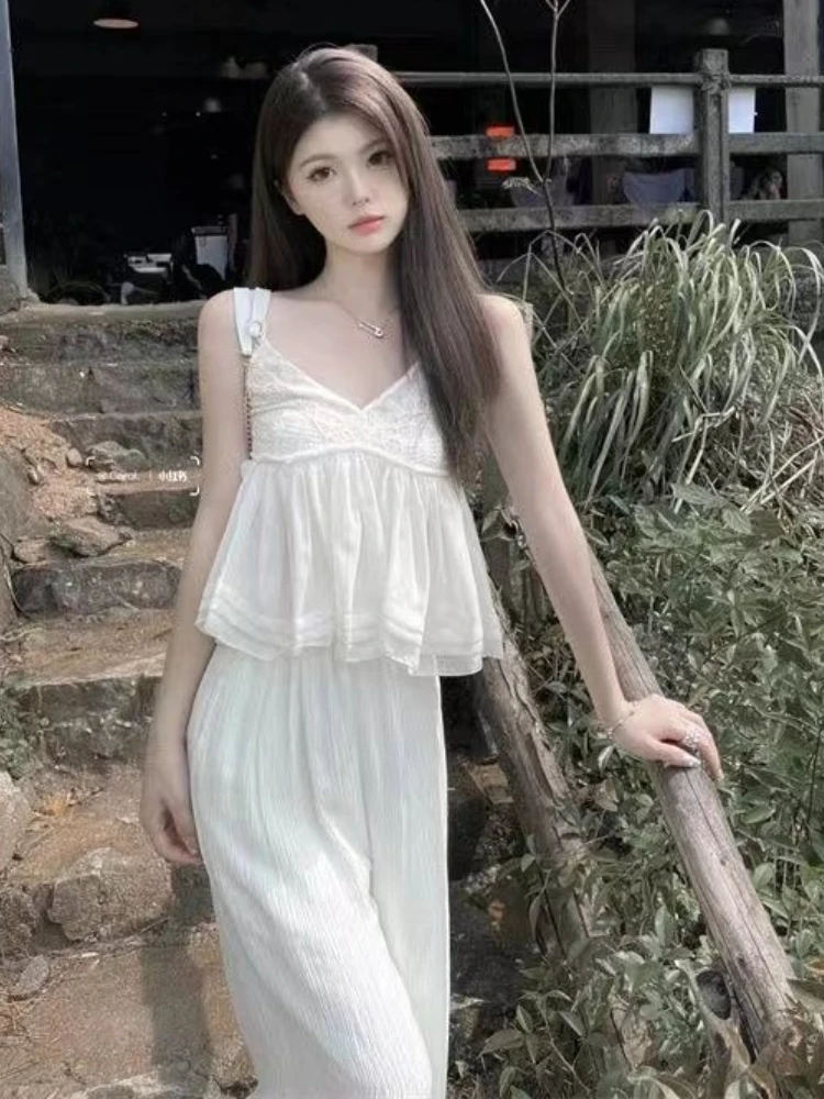 Fashion Elegant Matching Sets Sleeveless Ruffles Patchwork Tanks+high Waist Straight Pants Solid Color Summer Women's Clothing
Fashion Elegant Matching Sets Sleeveless Ruffles Patchwork Tanks+high Waist Straight Pants Solid Color Summer Women's Clothing