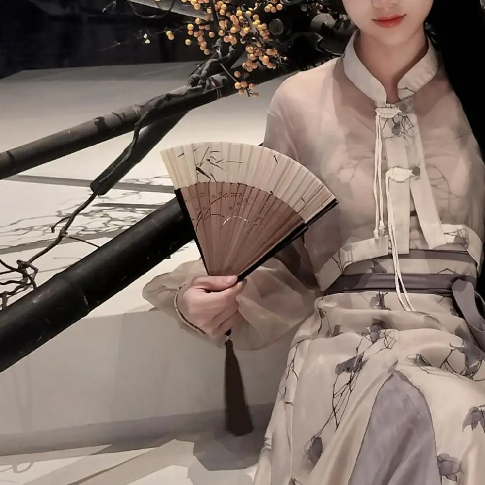 Hanfu Folding Fans Ancient Folding Fan Handhold Chinese Style Dance Fan Bamboo with Tassel Cheongsam Fan Dance Prop
Hanfu Folding Fans Ancient Folding Fan Handhold Chinese Style Dance Fan Bamboo with Tassel Cheongsam Fan Dance Prop