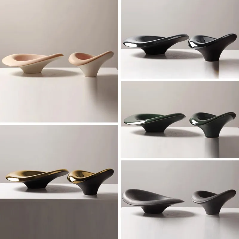 Modern minimalist art ceramic irregular storage tray tray model room sales office living room entrance decorative ornament
Modern minimalist art ceramic irregular storage tray tray model room sales office living room entrance decorative ornament