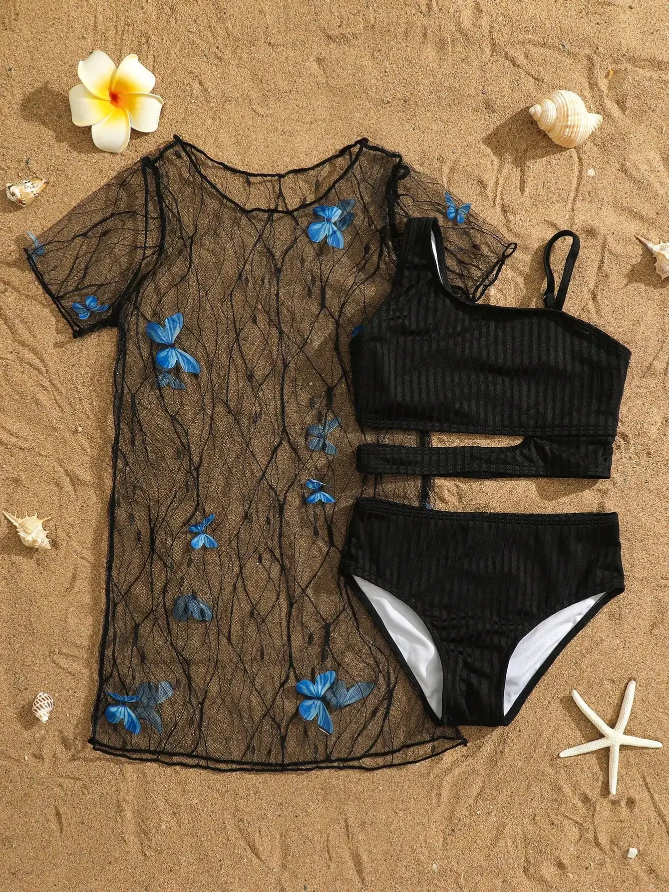 Женский комплект купальников с прозрачной накидкой и принтом бабочек
Женский комплект купальников с прозрачной накидкой и принтом бабочек